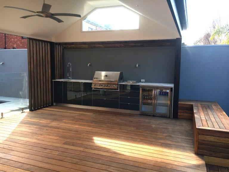 outdoor living room with bbq with timber decking and seating with roof in sandringham suburb of melbourne