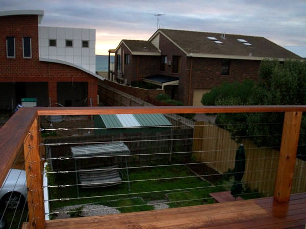 upstairs timber decking with stainless steel and timber railing in bayside suburb of melbourne