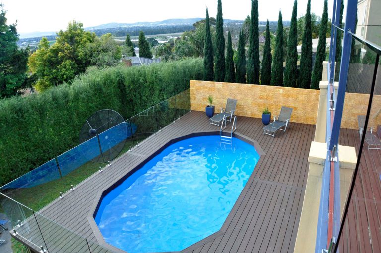 composite timber decking with glass pool fencing in eastern suburb of melbourne